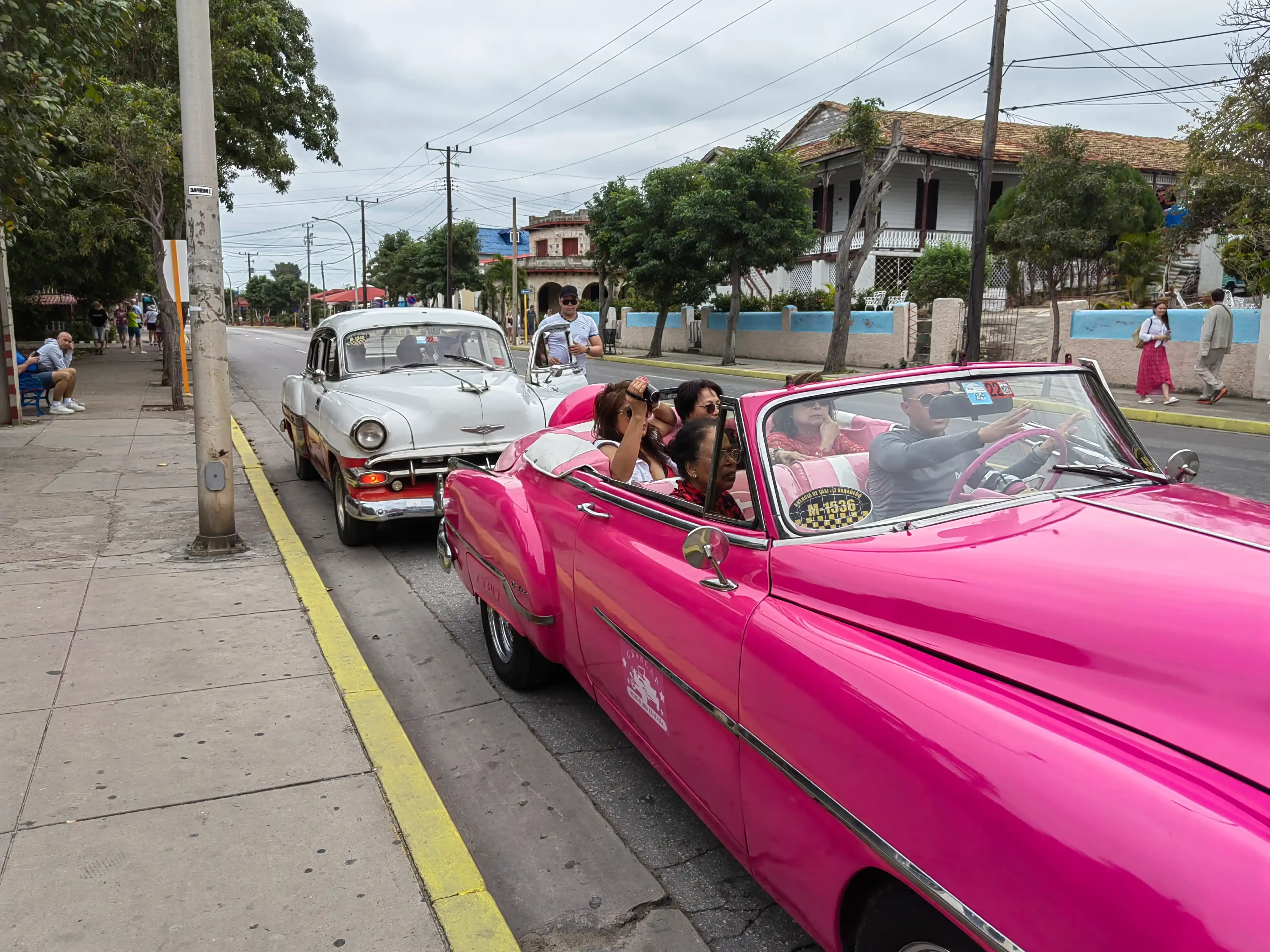 Pink classic convertible car