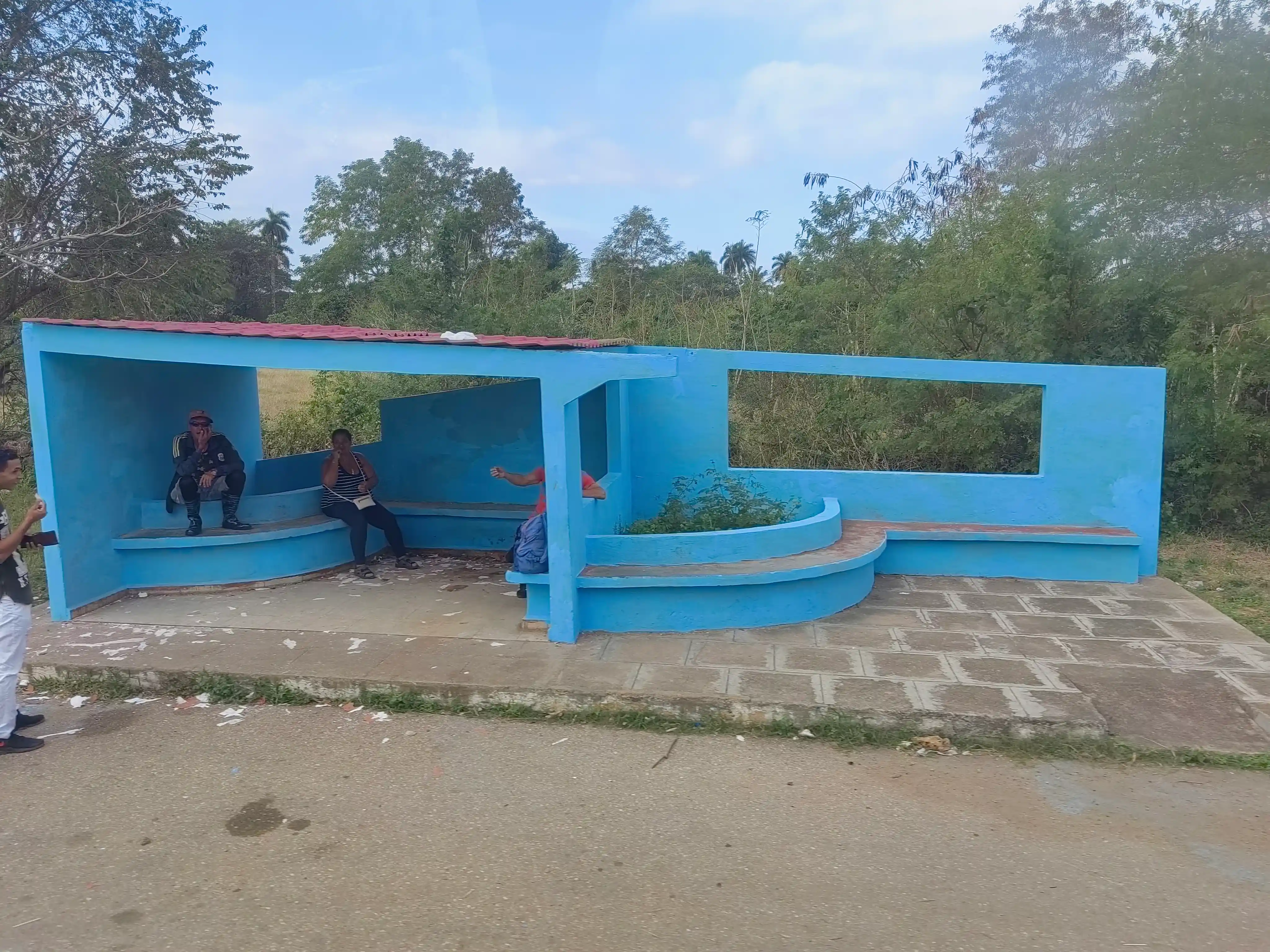 Blue concrete bus shelter